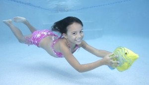 Kelly swimming underwater