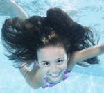 Kids - Kelly swimming underwater